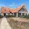Spacious holiday home in Nes with garden