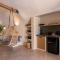 Sando Traditional Cave Villas with Jacuzzi and Sea view - Vourvoúlos