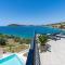 Luxury Seafront Villa Roots with private, heated pool, 5 en-suite bedrooms, enchanting sea views