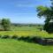 The Granary at Pentregaer Ucha, tennis court & lake. - Oswestry