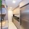 Adra 103 - Apartamento no centro de Bombinhas - Rooftop com piscina e academia - À poucos metros da praia - (Consultar serviços de roupas de cama e banho)
