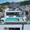 Adra 103 - Apartamento no centro de Bombinhas - Rooftop com piscina e academia - À poucos metros da praia - (Consultar serviços de roupas de cama e banho)