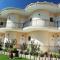 ILEKTRA Apartments Blue & Red