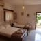 Chrysoula’s Welcoming Triple Room with Yard