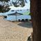 Beach house Hela - resort & tavern BAIN, free transport, pool, Island of Žut - Kornati - Pristanišće