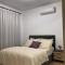 Luxury 2-bedroom condo with a private rooftop area
