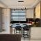 Luxury 2-bedroom condo with a private rooftop area