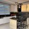 Luxury 2-bedroom condo with a private rooftop area