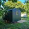 Shepherds hut surrounded by fields and the Jurassic coast - Bridport