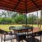 Sunshine Bloom by StayVista - Your Oasis with Pool, Lawn, Gazebo, and Poker Table - Lonavala