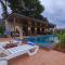 StayVista's The Cincin with Elegant Rooms, Snooker Table, Pool, Scenic View, and Jacuzzi - Lonavala