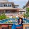StayVista's The Cincin with Elegant Rooms, Snooker Table, Pool, Scenic View, and Jacuzzi - Lonavala