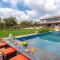 StayVista's The Cincin with Elegant Rooms, Snooker Table, Pool, Scenic View, and Jacuzzi - Lonavala