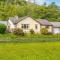 3 Bedroom luxury home, hot tub, stunning views of Killin, sitting on the River Dochart