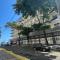 Loft Vista Mar 211 - Praia do Morro - prédio frente Mar - varanda com vista mar - elevador - atravessou a avenida, ja esta na Praia - internet - com garagem para carro pequeno