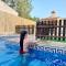 Chalet con piscina (B)
