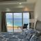 Beachfront 4 BR Penthouse - Pool Steps to Beach & Mins to Downtown - 罗萨里托
