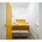 Apartamento amarillo en Atocha