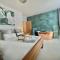 The Alice Apartment - by Coastline Retreats - Stunning Balcony Apartment with Sea Views - Alice in Wonderland Themed Secret Room - Luxury Copper Bath in Master Bedroom