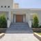 Seafront Villa Nafsika - Private Heated infinity Pool - Direct access to the beach - Play area - 哈利库纳斯