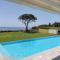 Seafront Villa Nafsika - Private Heated infinity Pool - Direct access to the beach - Play area - Halikounas