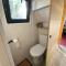 Tiny house sur terrain boisé à 10 mn de la mer - Férel