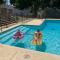 Luxury Riverside Estate - 3BR Home or 1BR Cottage or BOTH - Sleeps 14 - Swim, fish, relax, refresh - أندرسون