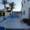 Greek Island Style 2 bedroom Villa with Pool next to the Sea