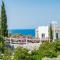 Seafront apartment with private garden