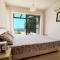 Seafront apartment with private garden
