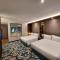 CHRISTEE SUITES HOTEL