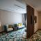 CHRISTEE SUITES HOTEL