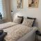 Nowoczesny Apartament w Dzierżoniowie - parter - balkon - pokój + sypialnia