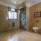 Saffronstays Casa Del Palms, Alibaug - luxury pool villa with chic interiors, alfresco dining and island bar