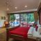 Saffronstays Casa Del Palms, Alibaug - luxury pool villa with chic interiors, alfresco dining and island bar