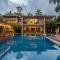 Saffronstays Casa Del Palms, Alibaug - luxury pool villa with chic interiors, alfresco dining and island bar - Alibag