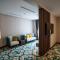 CHRISTEE SUITES HOTEL