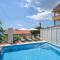 Apartments Mastelic with pool next to the beach
