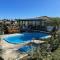 Villa Santorini Praia do Rosa com piscina e jacuzzi