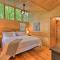 Lakefront Glass House Cabin with Mountain Views!