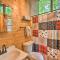 Lakefront Glass House Cabin with Mountain Views!