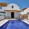 Sea Breeze Santorini Beach Resort, Curio By Hilton - 佩里沃罗