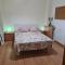 Habitación con baño privado- En casa familiar Beatriz