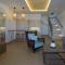 Sea Breeze Santorini Beach Resort, Curio By Hilton - 佩里沃罗