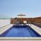 Sea Breeze Santorini Beach Resort, Curio By Hilton - 佩里沃罗