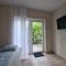 Öt Fenyő Apartmanház