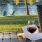 Luxury Riverside Estate - 3BR Home or 1BR Cottage or BOTH - Sleeps 14 - Swim, fish, relax, refresh - أندرسون