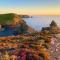 Polrunny Farm Seaberry Cottage with a sea view and log burner