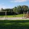 Nice chalet with spacious garden, at a holiday park in Friesland - Tzummarum