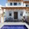 Sea Breeze Santorini Beach Resort, Curio By Hilton - 佩里沃罗